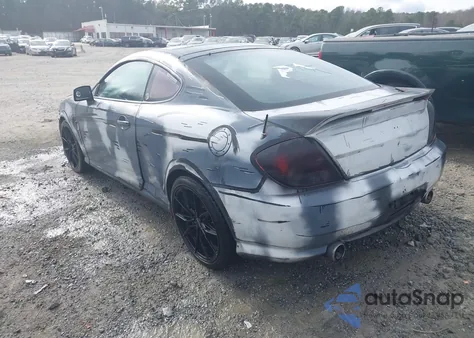 2005 Hyundai Tiburon Gt/Se z USA, uszkodzony, nr VIN KMHHN65F95U167571